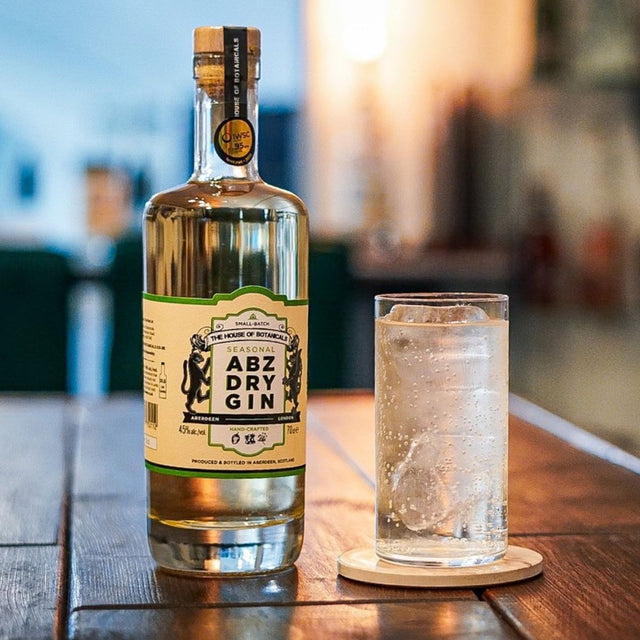 Woman enjoying gin tasting at House of Botanicals Aberdeen